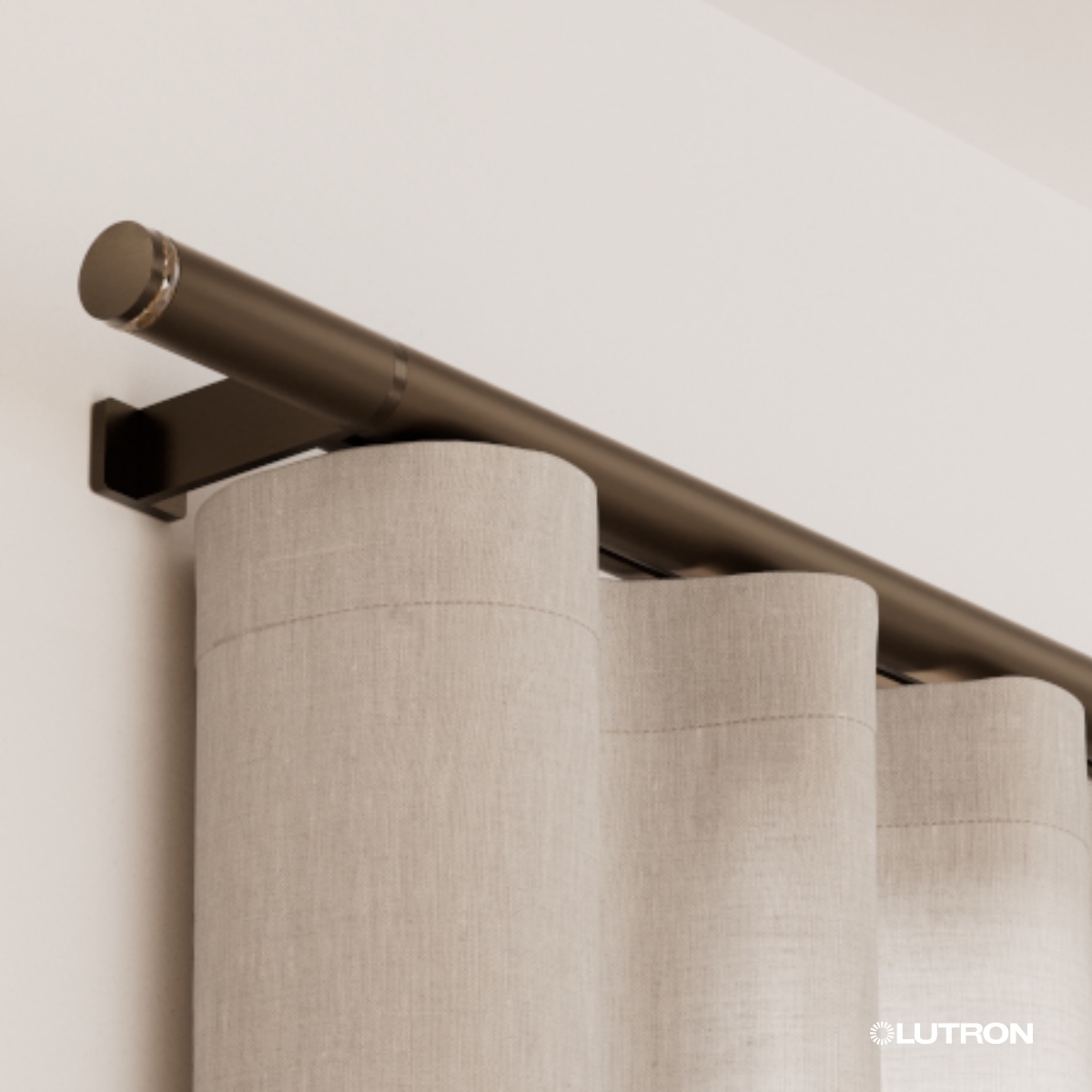 Bronze Anodized Palladiom drapery rod finial with crystal detail above linen ripple fold panels