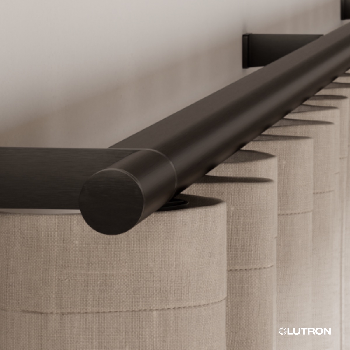 Black Anodized Palladiom drapery rod in close-up above linen ripple fold panels