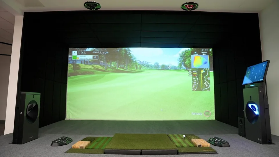 Simulator screen with ceiling sensors, hitting mat and kiosk